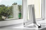 Double glazing Woking segment on window sill to demonstrate how double glazing looks inside the frame
