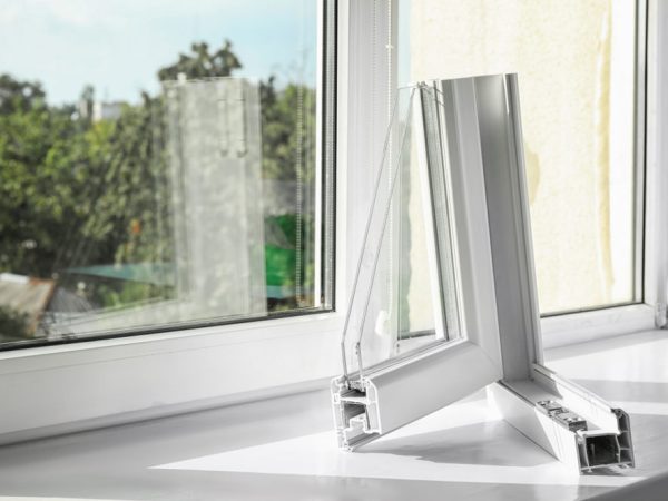 Double glazing Woking segment on window sill to demonstrate how double glazing looks inside the frame
