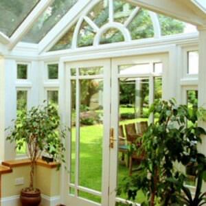 Wooden conservatory installed with double glazing Surrey