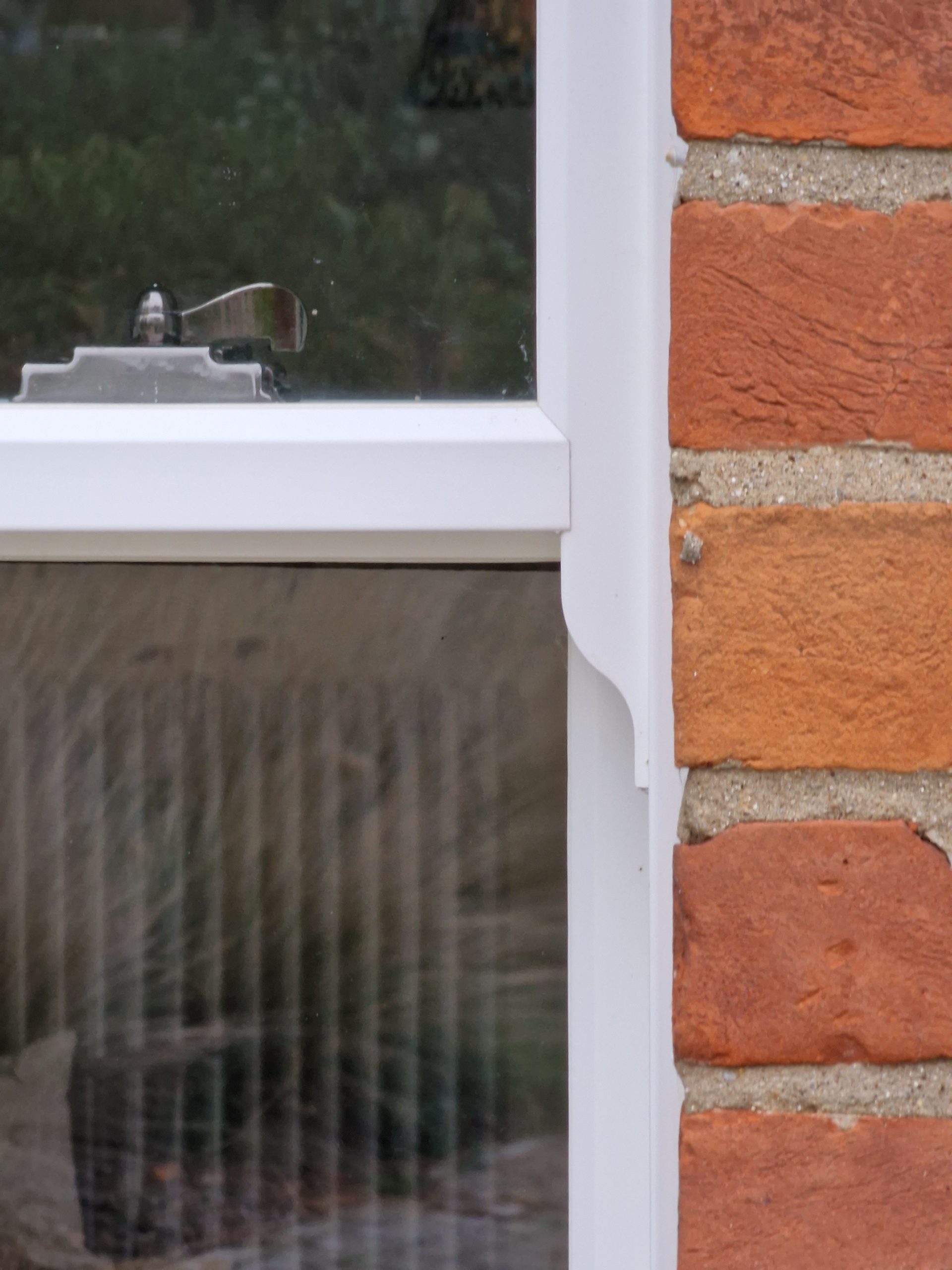 Close up of an authentic run-through sash horn on a Roseview window