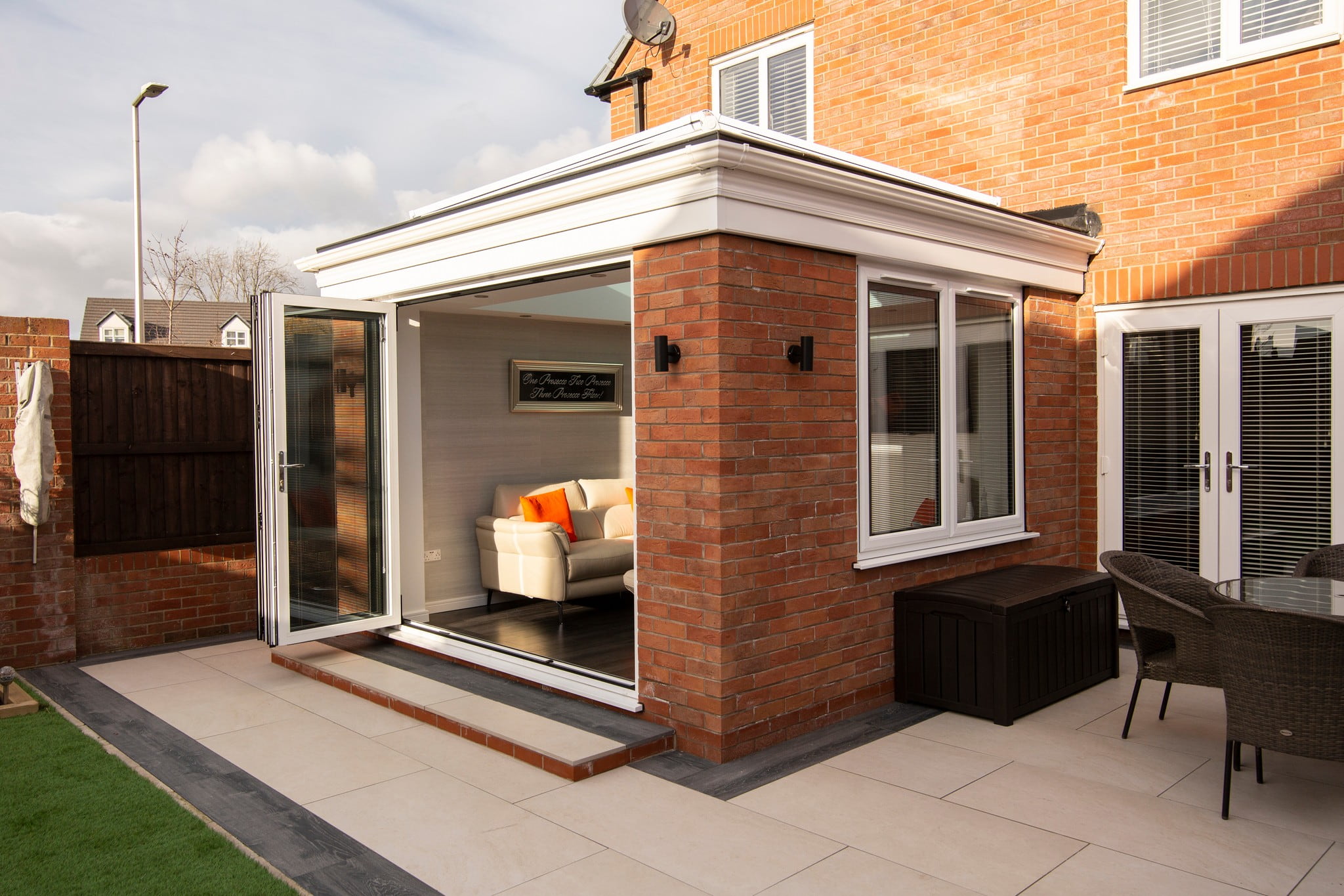 An outdoor shot of a flat roof extension.