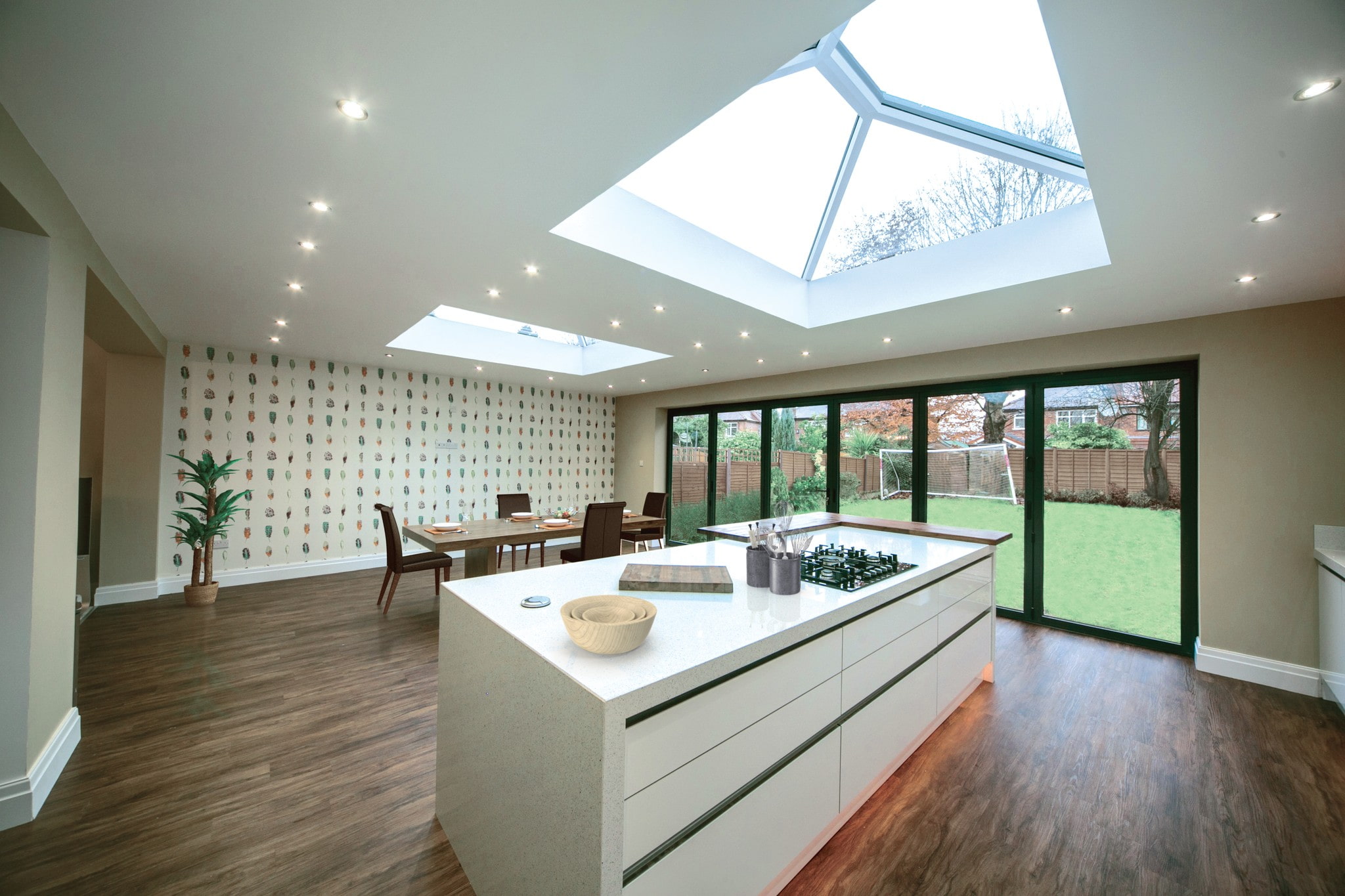 Large kitchen diner extension with a view of the garden.