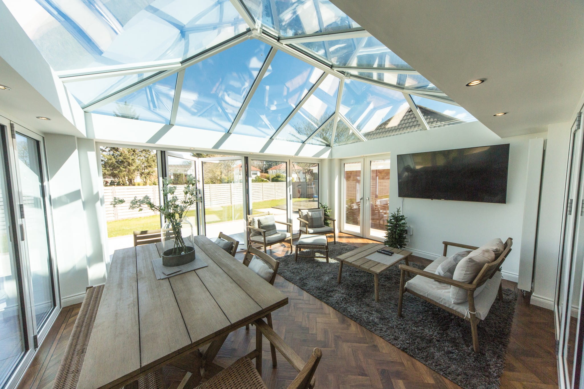 A glass roof extension from the outside.