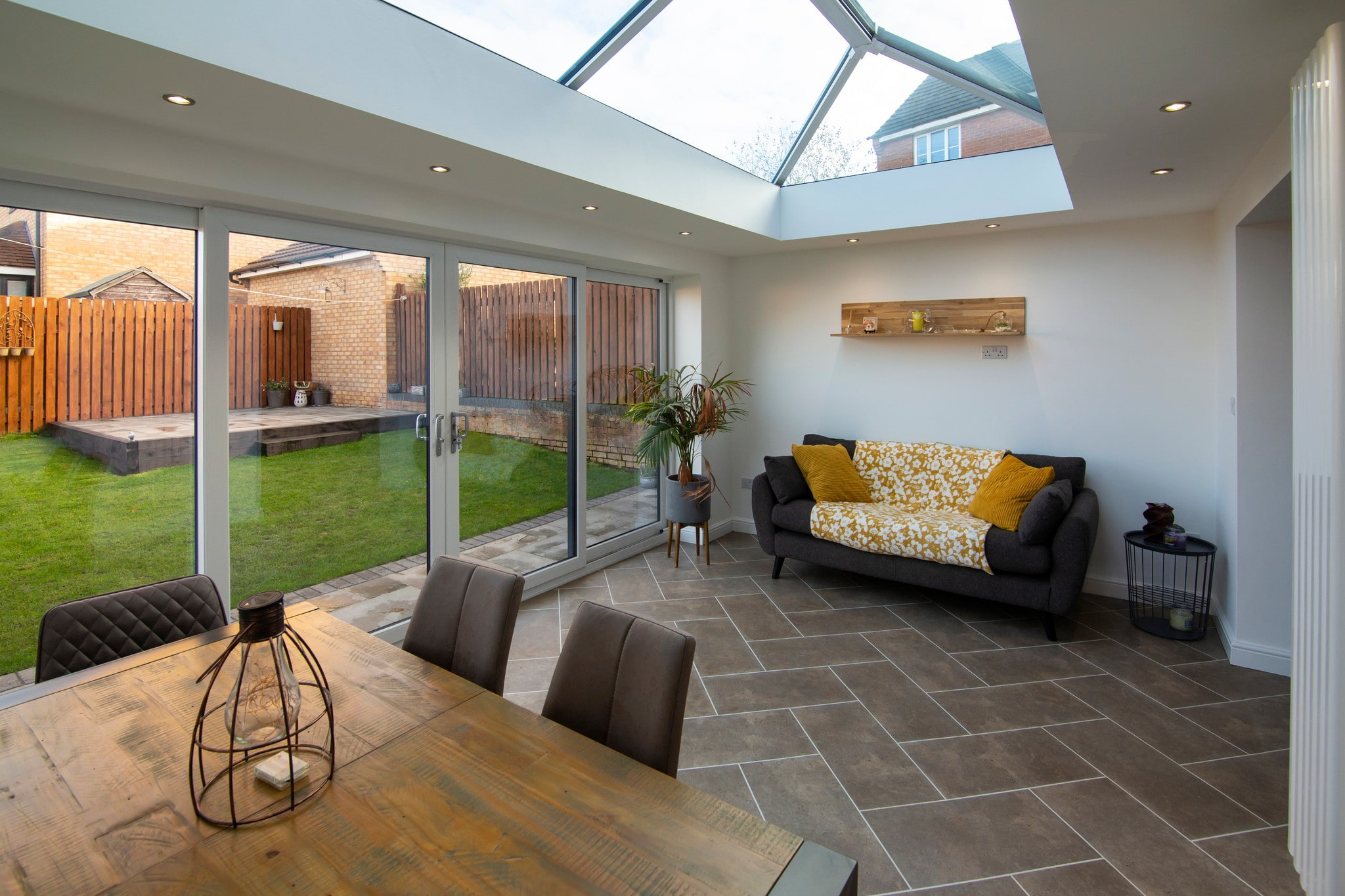 An aerial photo of a single storey extension with a patio feature.