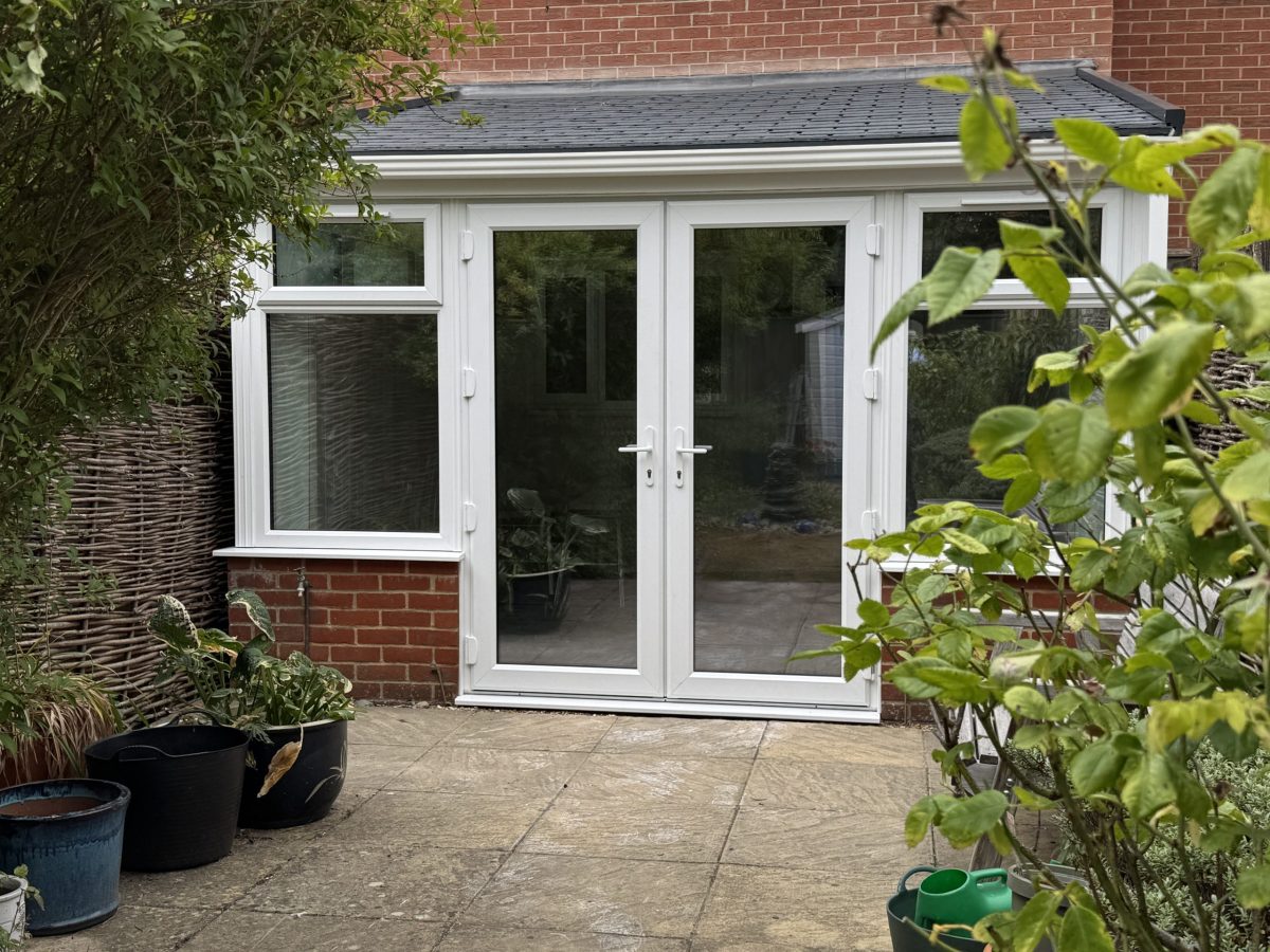 Refurbished conservatory with a new solid tiled roof
