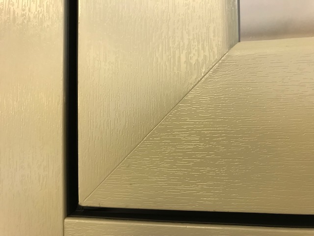Close up of Graf welded flush sash window showing seamless invisible corner