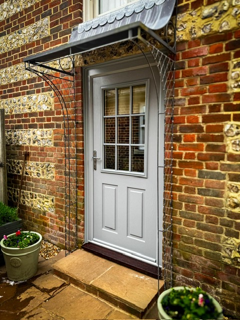A grey composite door.