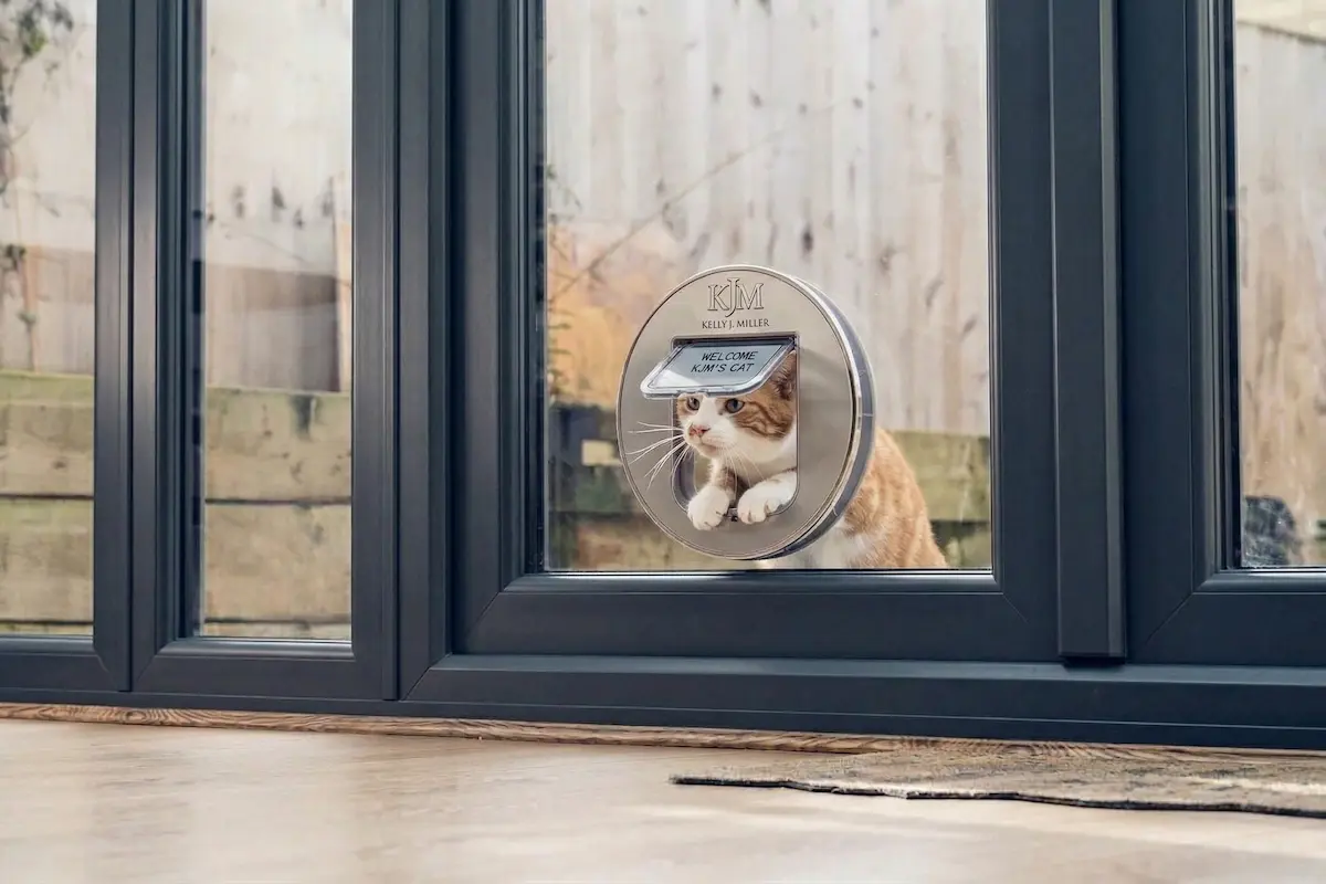 A microchip cat flap installed into a new toughened double glazed glass door unit