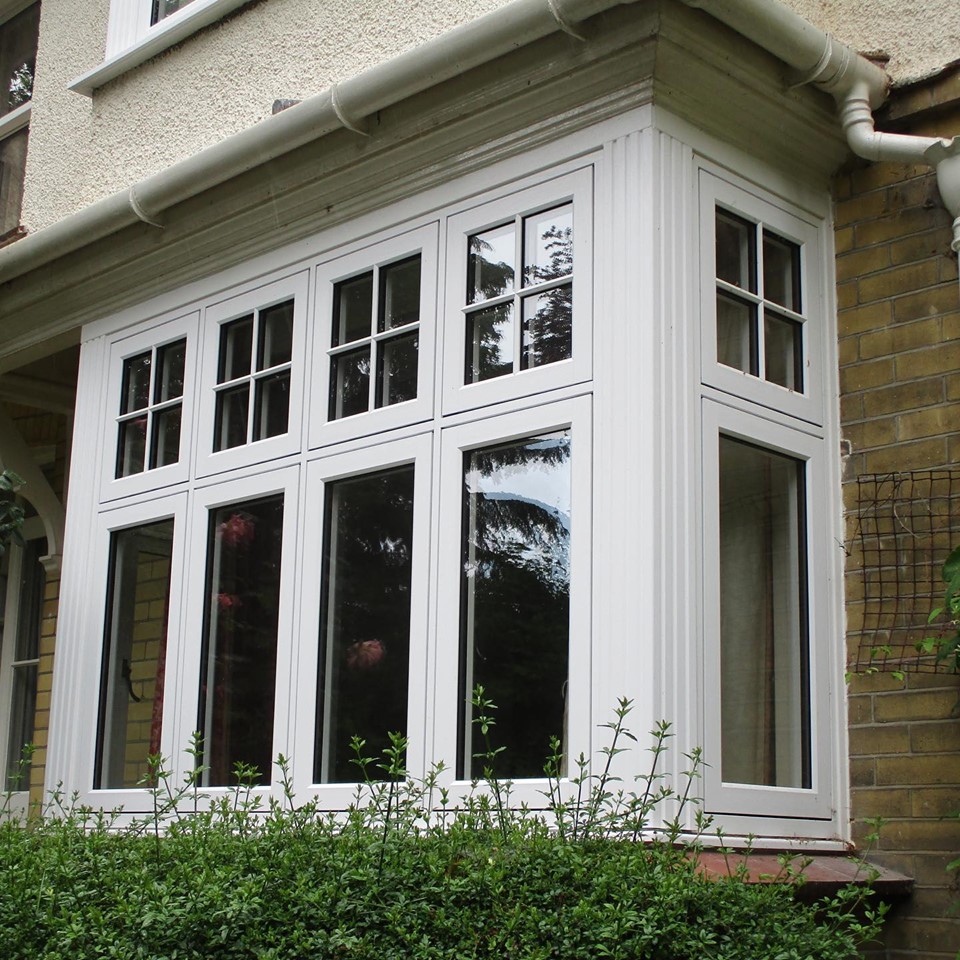 Residence 9 bay window with astragal bars