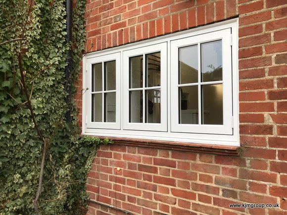 Residence 9 window in white with Georgian astragal bar