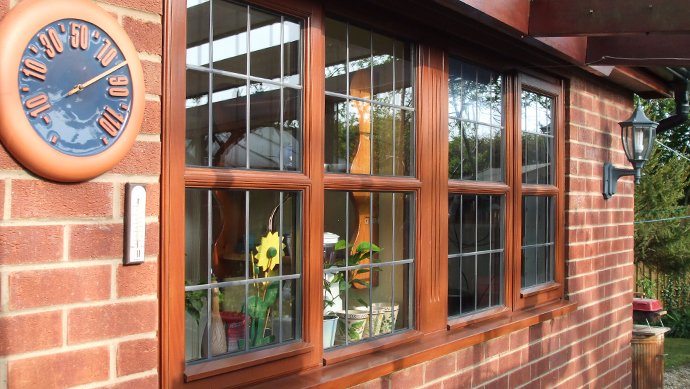 Timber Window with Square Lead Hardwood window stained with square lead glass