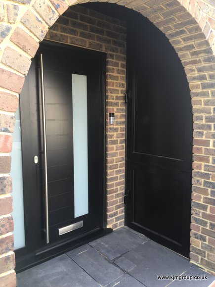 Aluminium entrance door in brown