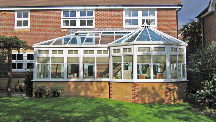 P-shape conservatory front view P-Shape conservatory with feature bricks